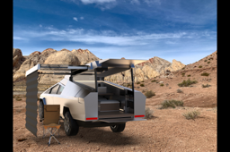 In the desert — camper deployed against the Arizona landscape